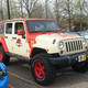 A JK Wrangler with Jurassic Park livery.